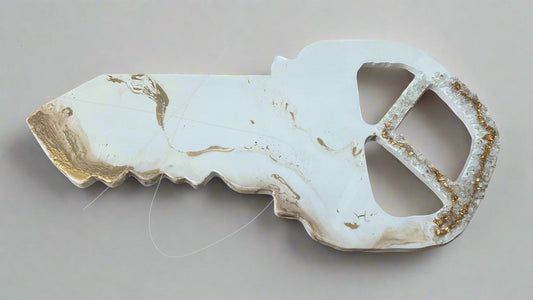 white and gold luxury signature key made of wood and cut glass and acrylic paint